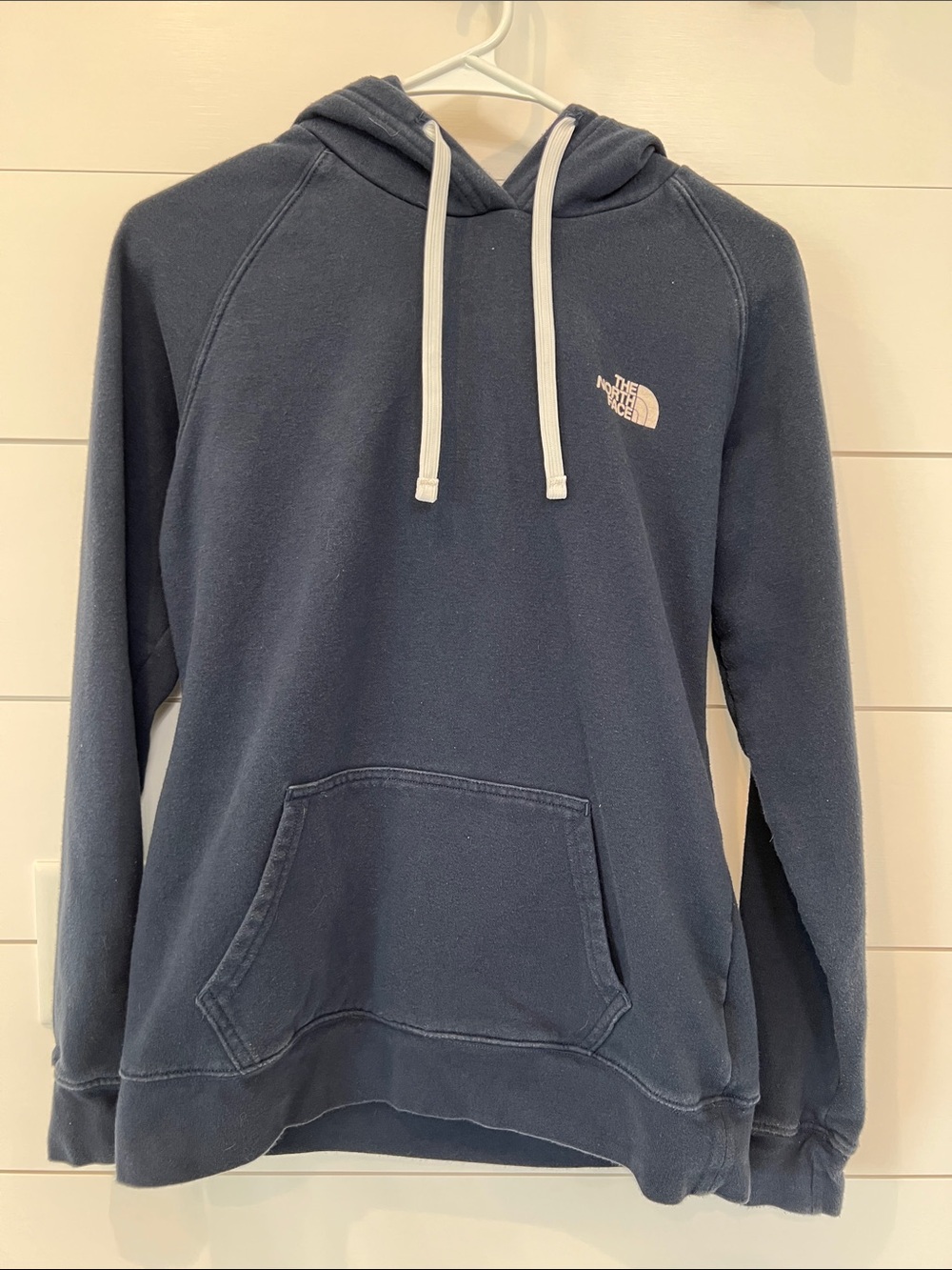 The North Face Women’s  Navy Hoodie with White Drawstrings